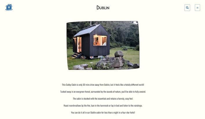 Cosy Cabins website on laptop